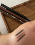 Eyebrow pencil with brush